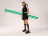Модел в черна цялостна визия с черни сандали, който държи дъска за сърф - кампания Лято 2023